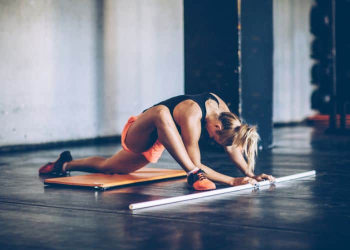 CrossFit athlete stretching