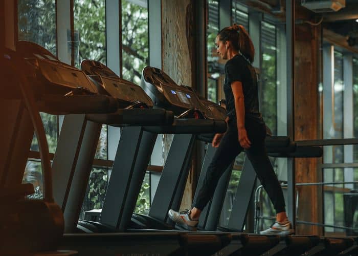 woman walking on a treadmill